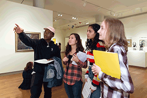 Student Guiding others in an exhibition